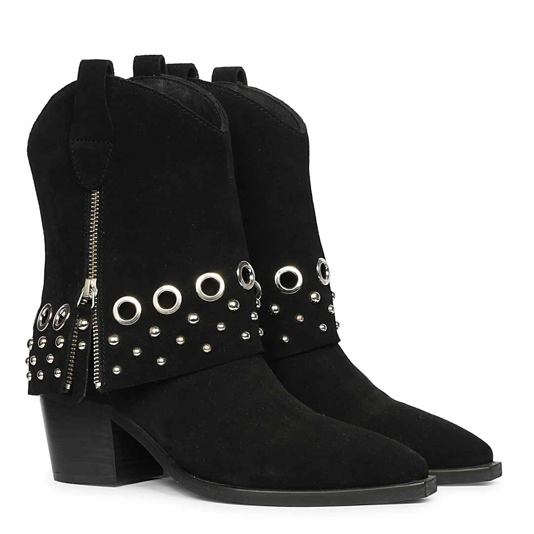 Pair of black studded fold-over ankle boots with side zippers and block heels shown from an angled front view