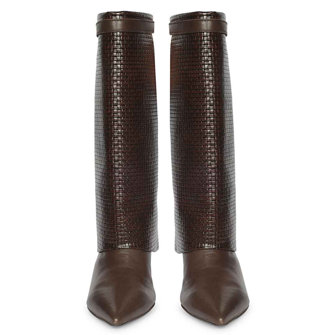 A pair of dark brown pointed-toe boots with tall, textured woven shafts and smooth leather lower sections
