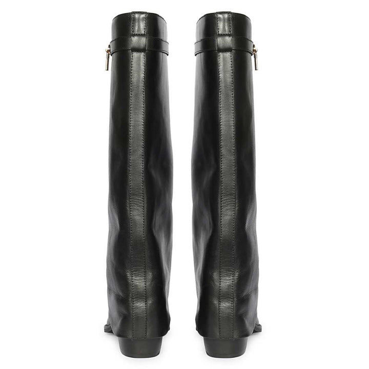 A pair of black leather knee-high boots shown from the back, featuring a side zipper with a small gold-tone pull tab and a low block heel