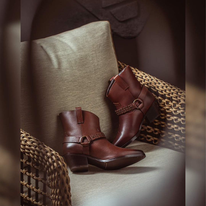 Metal studded women’s leather ankle boots