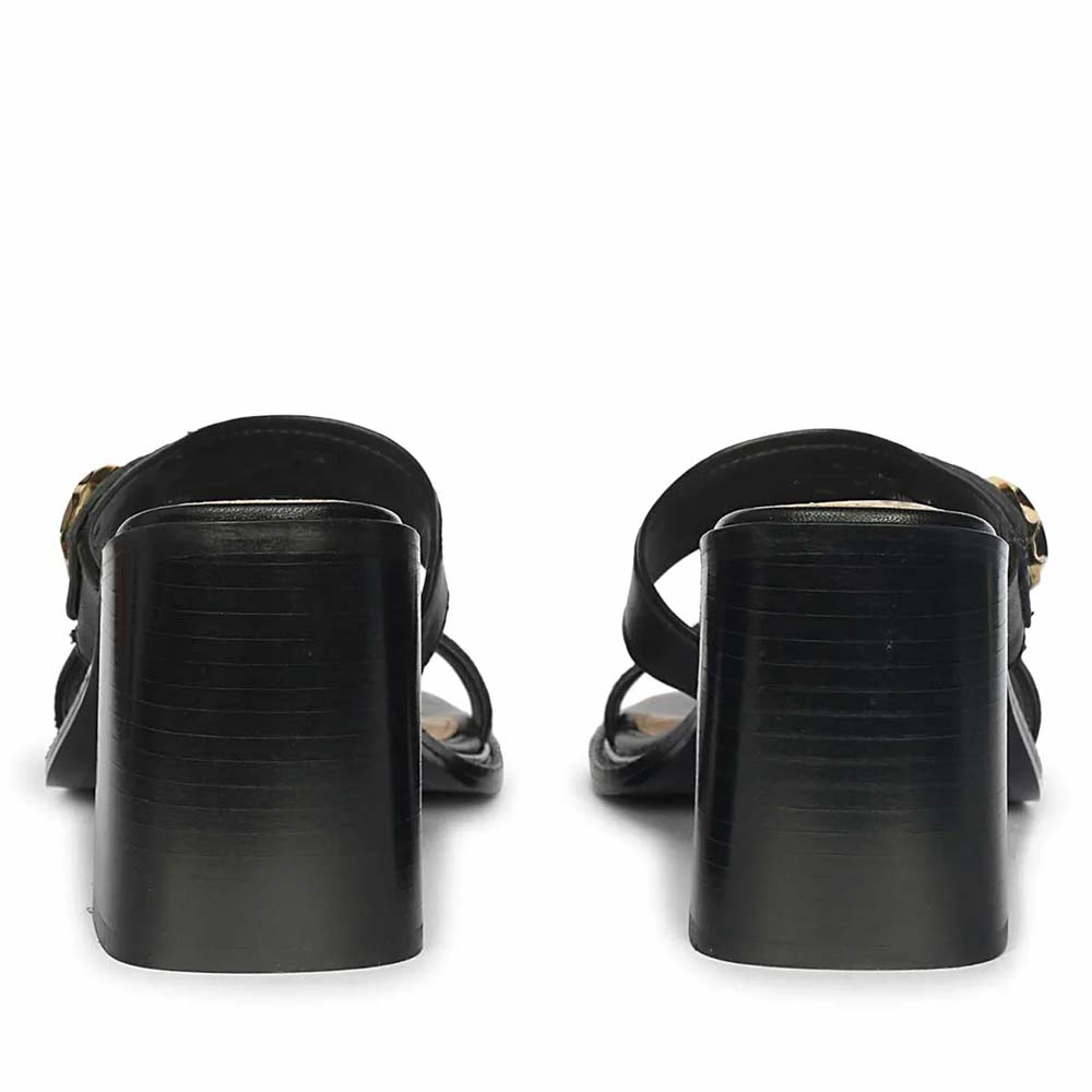 Stylish Black Heels with Gold Emblems