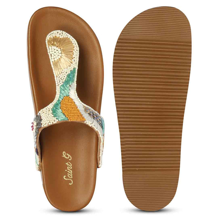 Textured sole of tan leather thong sandals designed for comfort and grip