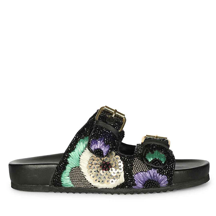 Side view of black embroidered leather sandals with supportive footbed