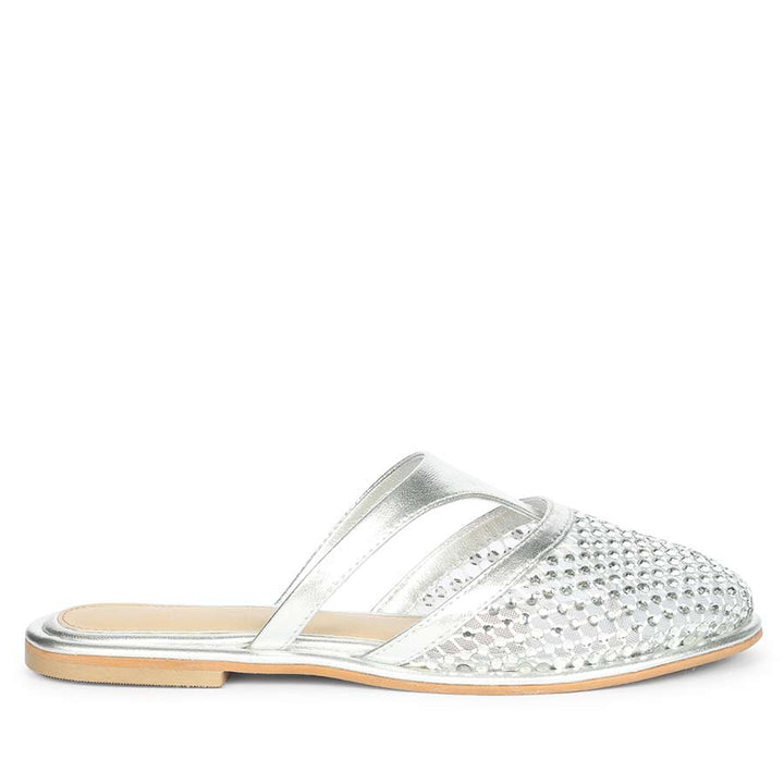 Side profile of silver crystal mesh leather mule flats for women