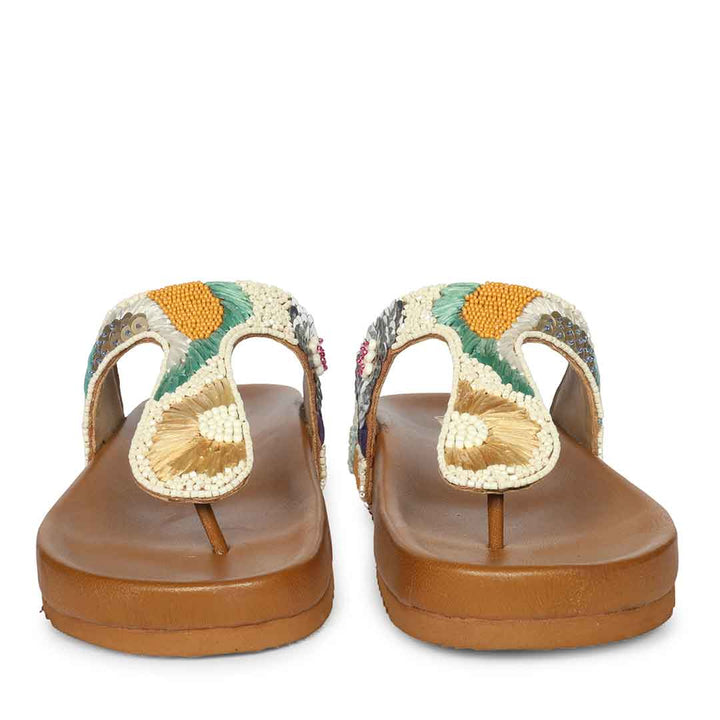 Tan leather thong footbed sandals with embroidered artisan detailing