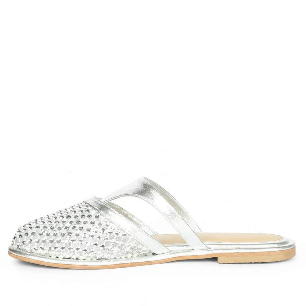 Silver sandal with rhinestone embellishments on a white background