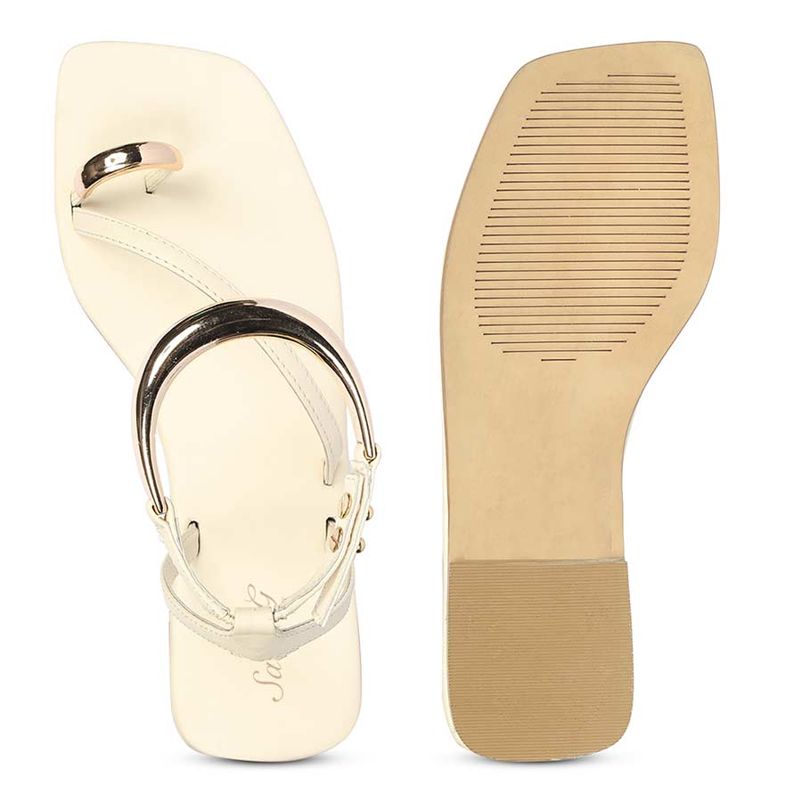 Gold accent off white sandals