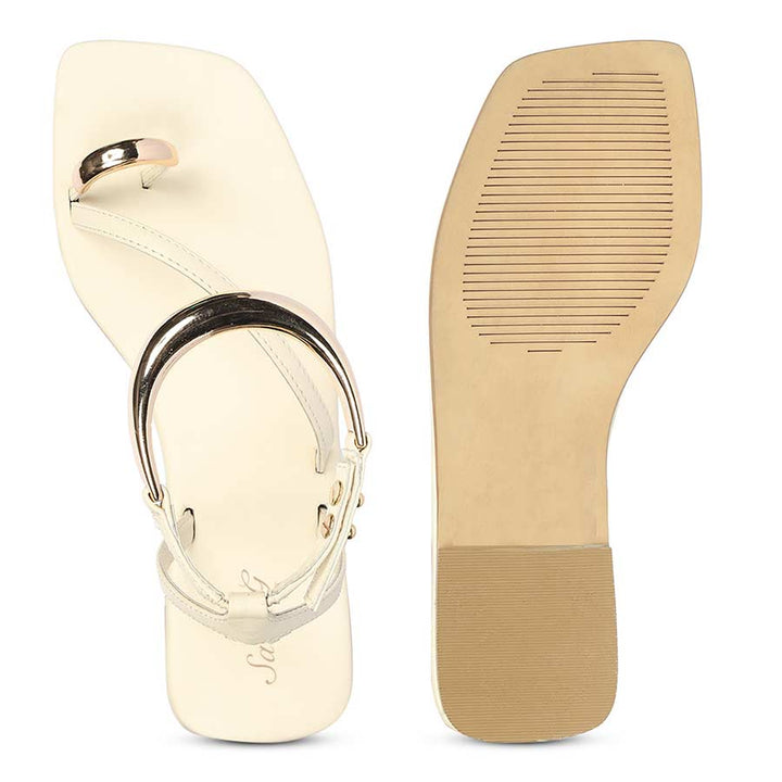 Gold accent off white sandals