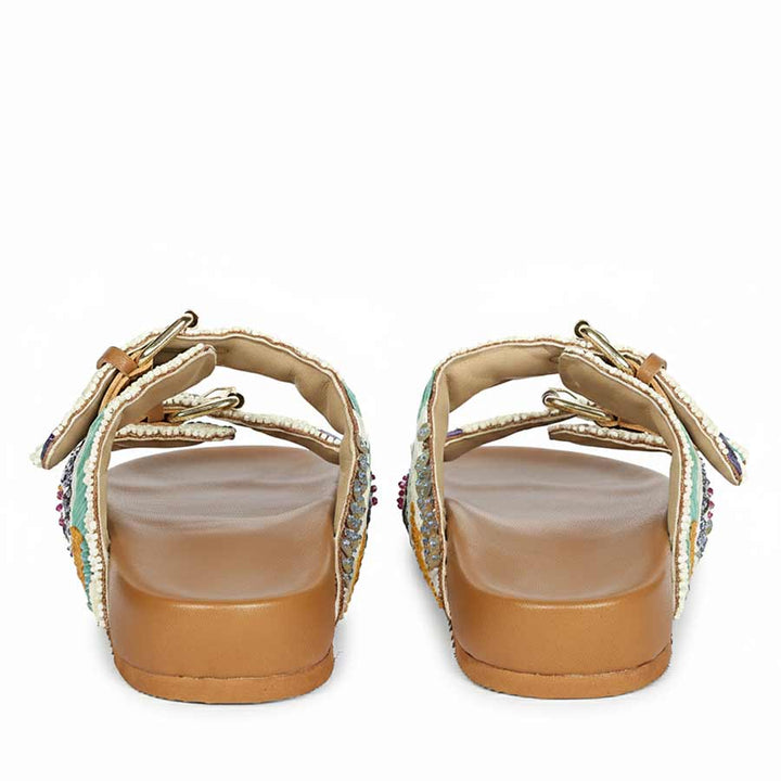 Back view of tan leather footbed sandals with supportive straps and soft footbed