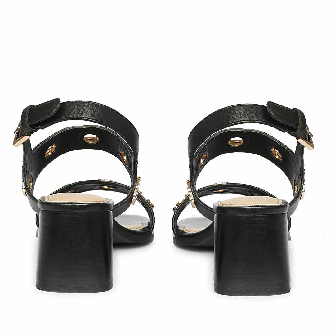 Saint Alviera Gold Flower Eyelets Black Leather Block Heels