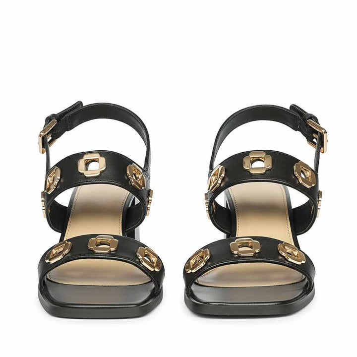 Saint Alviera Gold Flower Eyelets Black Leather Block Heels