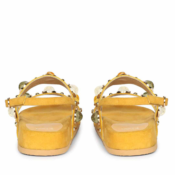 Back view of suede leather platform sandals with elevated summer styling