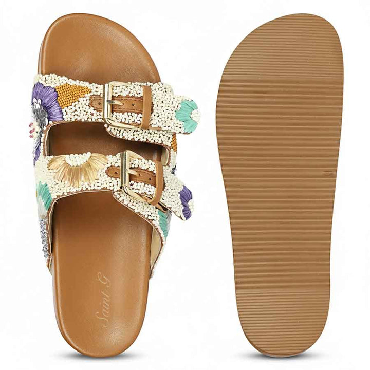 Textured sole of tan leather footbed sandals designed for comfort and grip