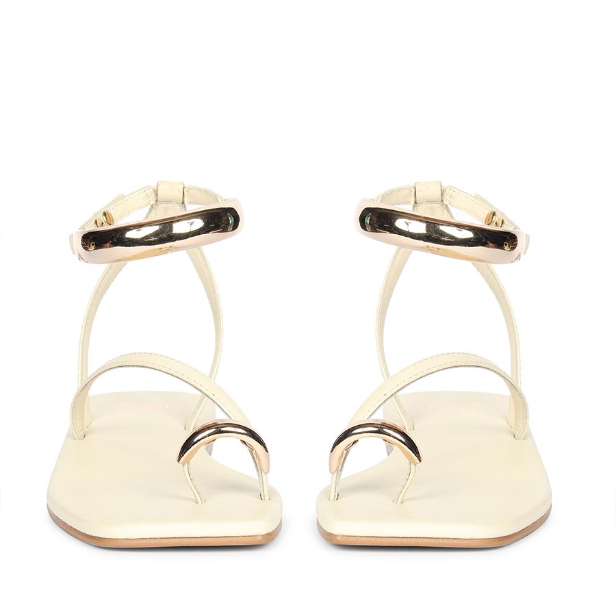 Elegant off white flat sandals