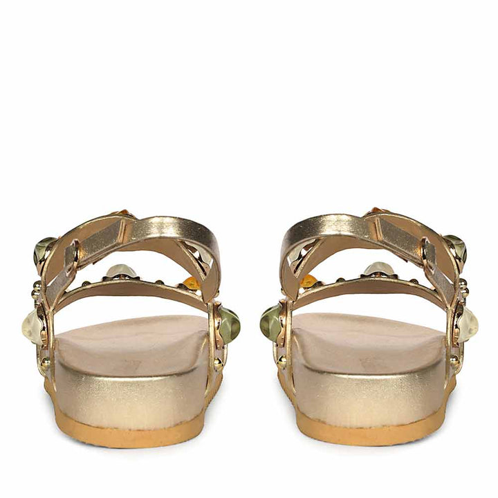 Rear view of metallic gold leather sandals designed for luxury comfort