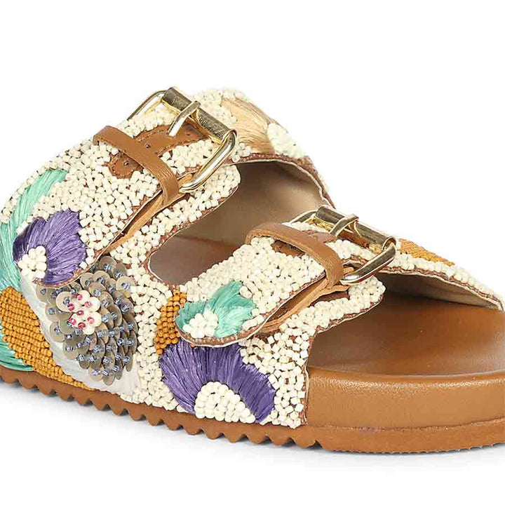 Tan leather footbed sandals with hand embroidery and cushioned sole for women