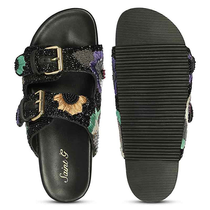Grip sole of black leather footbed sandals designed for stability and comfort