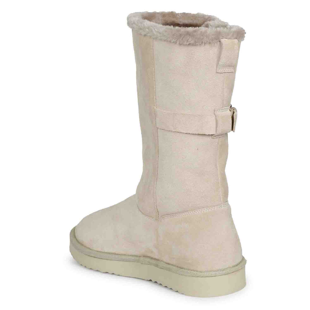 Chic ivory suede boots with decorative buckle, crafted by Saint Aurelia for snug comfort and style