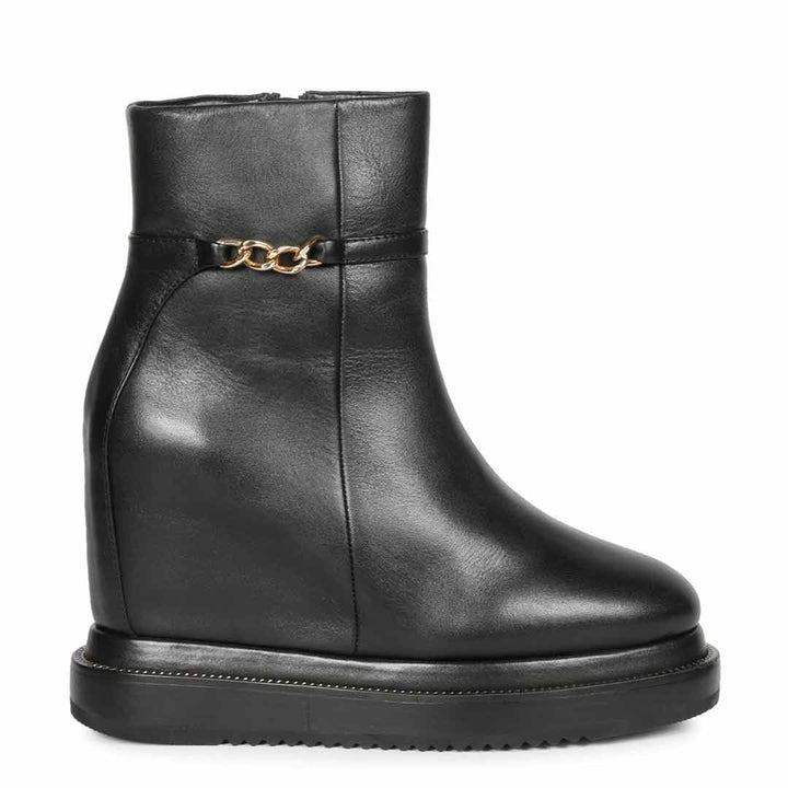 Womens black leather wedge ankle boots with gold side zip, side view