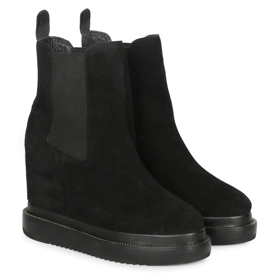 Black wedge ankle boots for women with elastic side panel, angled view