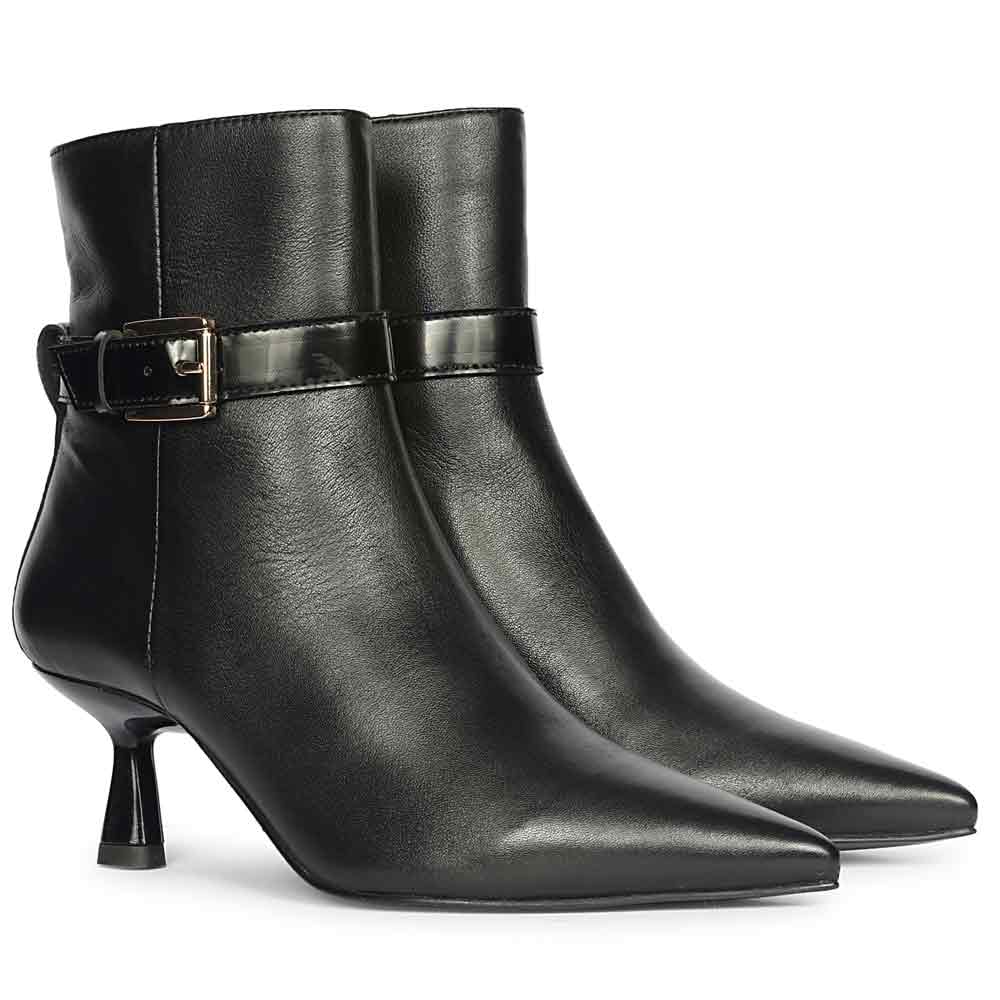 Pair of black leather kitten heel ankle boots with pointed toes and buckle strap detailing