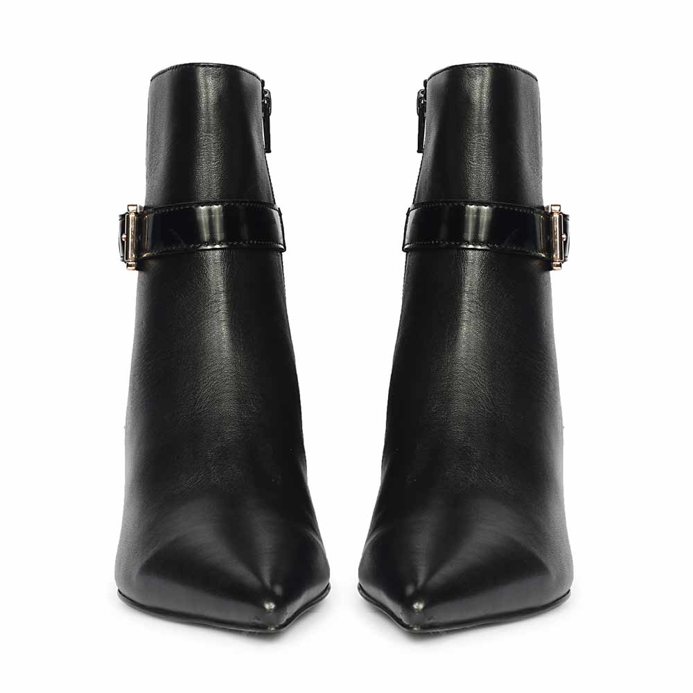 Front angle view of black pointed-toe ankle boots with clean leather upper