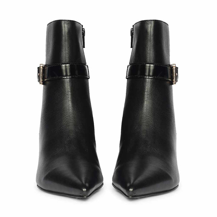 Front angle view of black pointed-toe ankle boots with clean leather upper