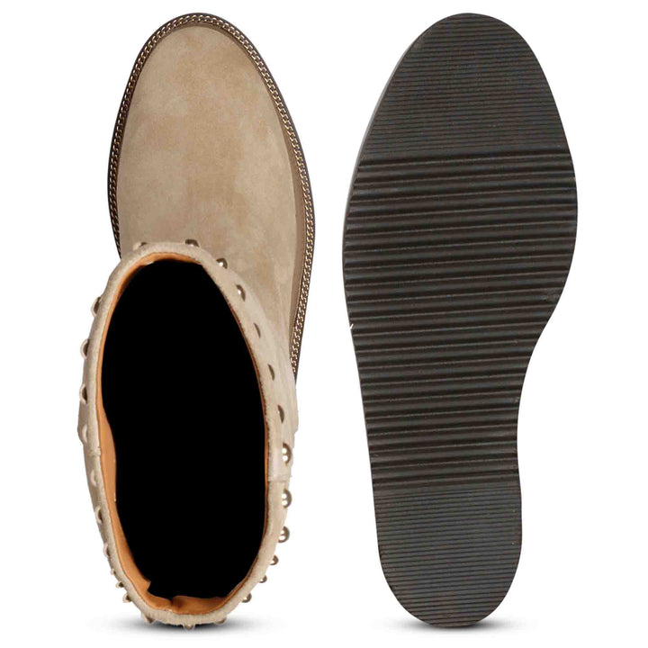 Sole and inside wedge of womens ivory suede long boots
