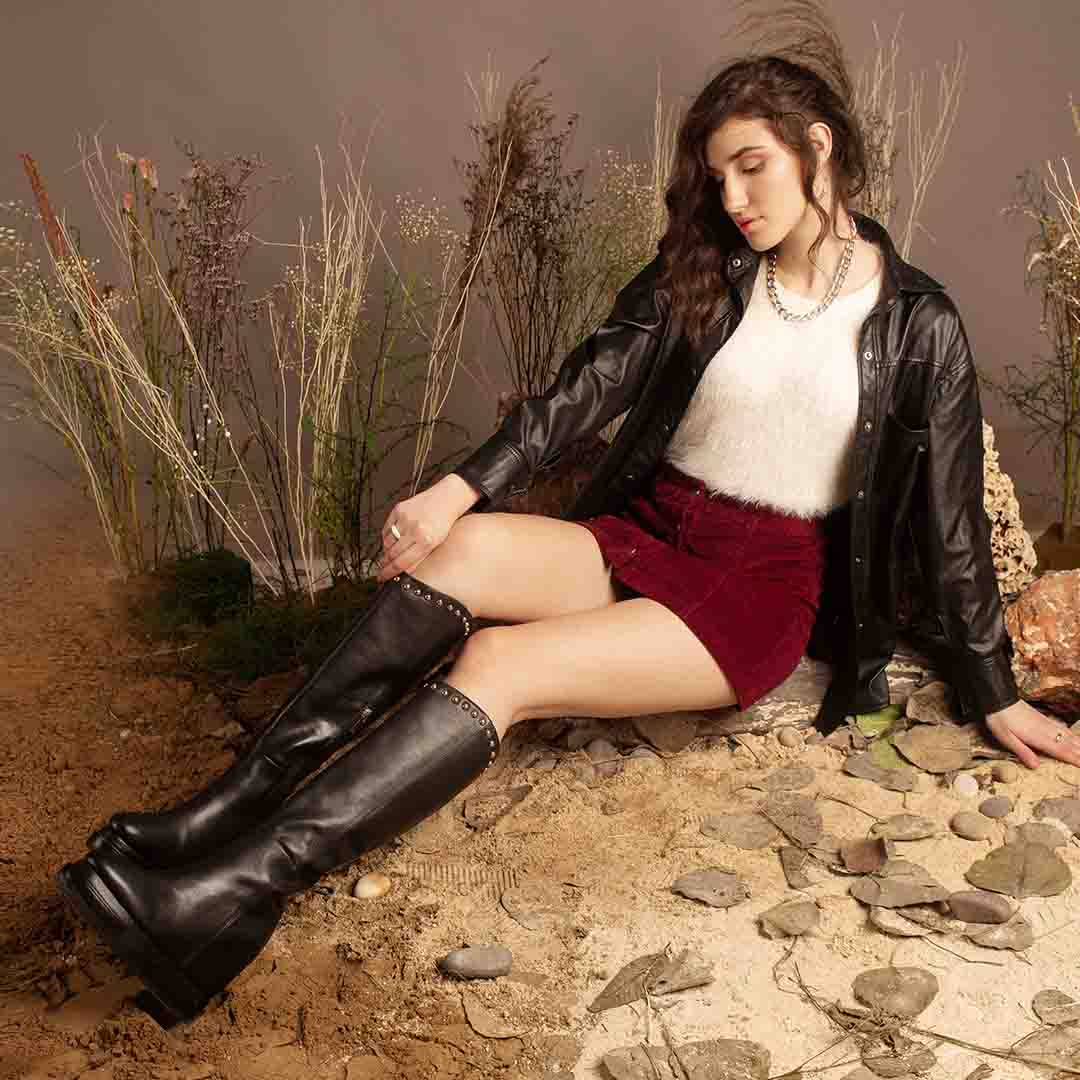 Womens black studded wedge boots