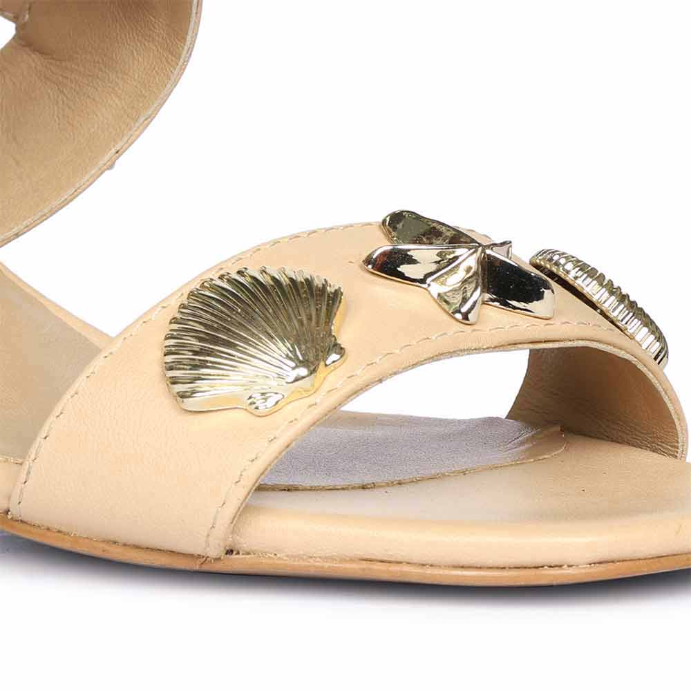 Star and shell embellished heeled sandals