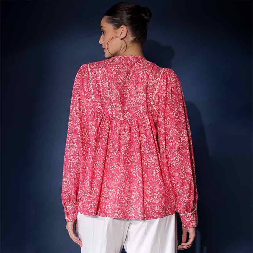 Women's pink floral voile top by Saint Adara, back view.