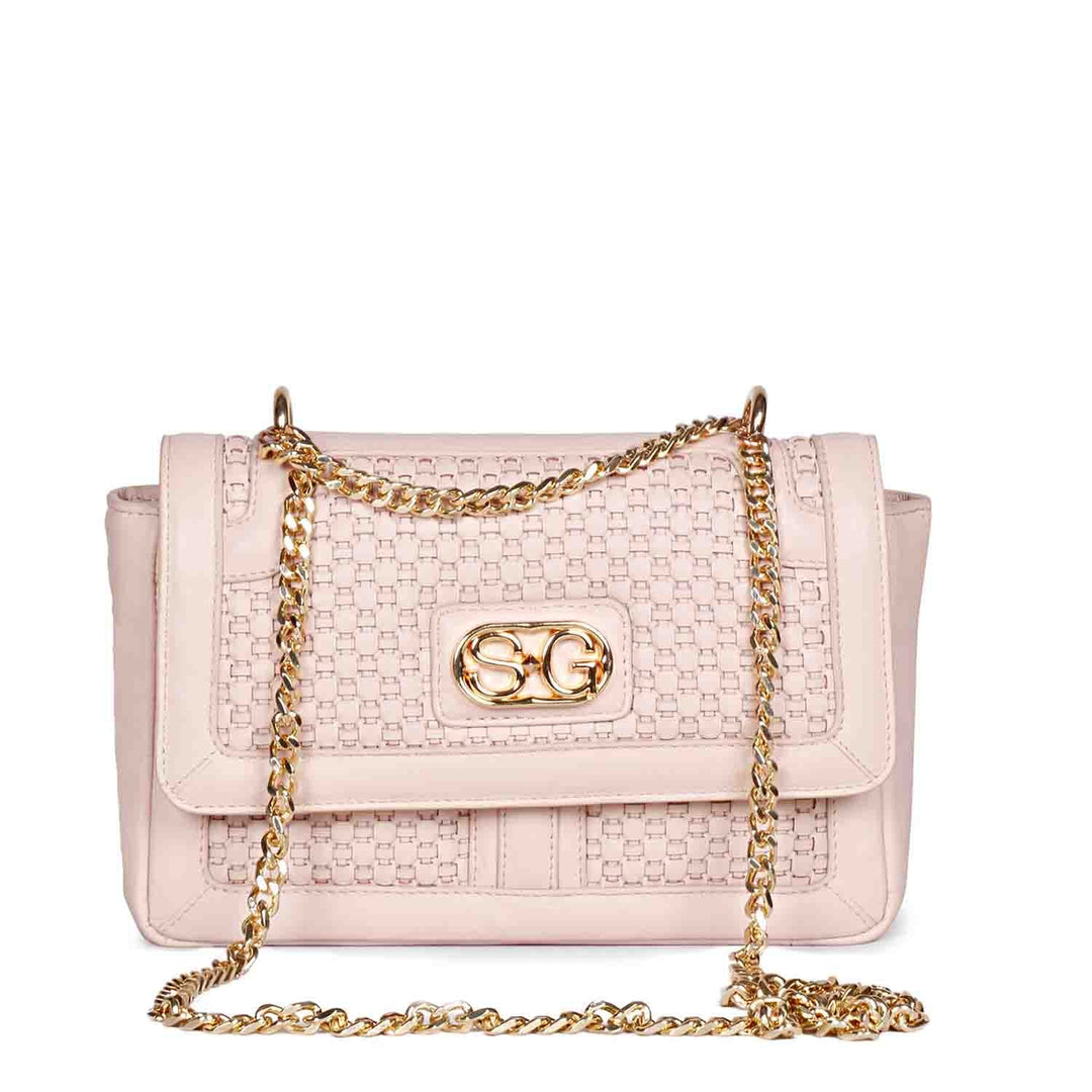 Saint Addie pink blush hand-woven leather sling bag for women UK, front view with flap and gold-tone chain strap.