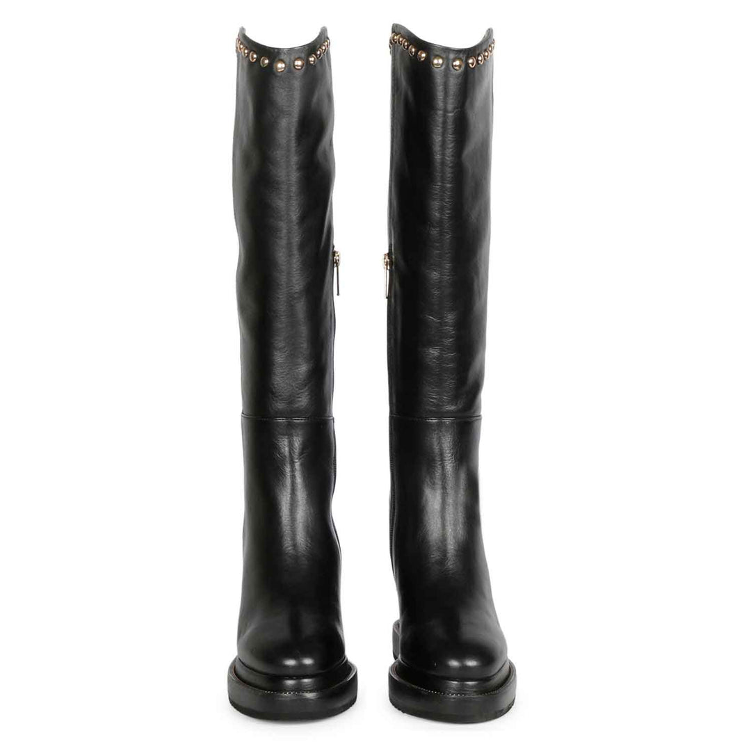 Black leather wedge knee high boots for women UK, pair view showing gold stud trim