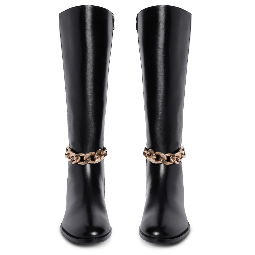 Women's black leather knee high boots, front pair view of gold chain embellishment