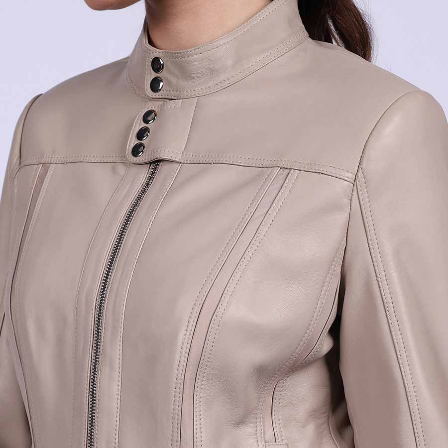 Close-up of button-tab collar on Saint Amaya beige leather jacket UK
