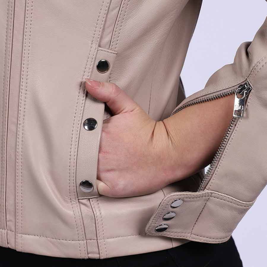 Close-up of snap pocket and cuff on Saint Amaya beige leather jacket UK