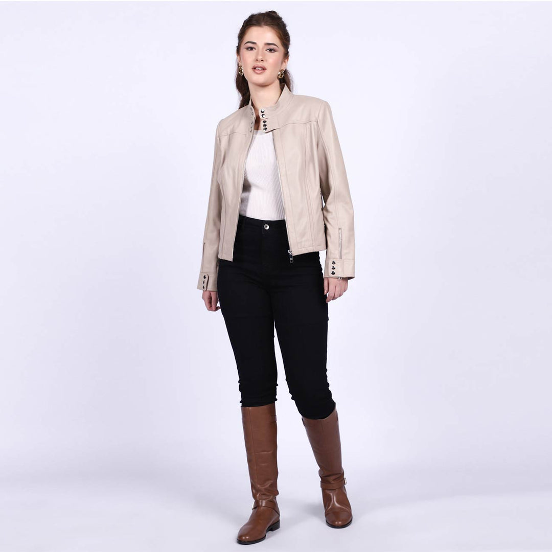Women's beige leather cafe racer jacket UK by Saint Amaya, styled full-length lifestyle shot