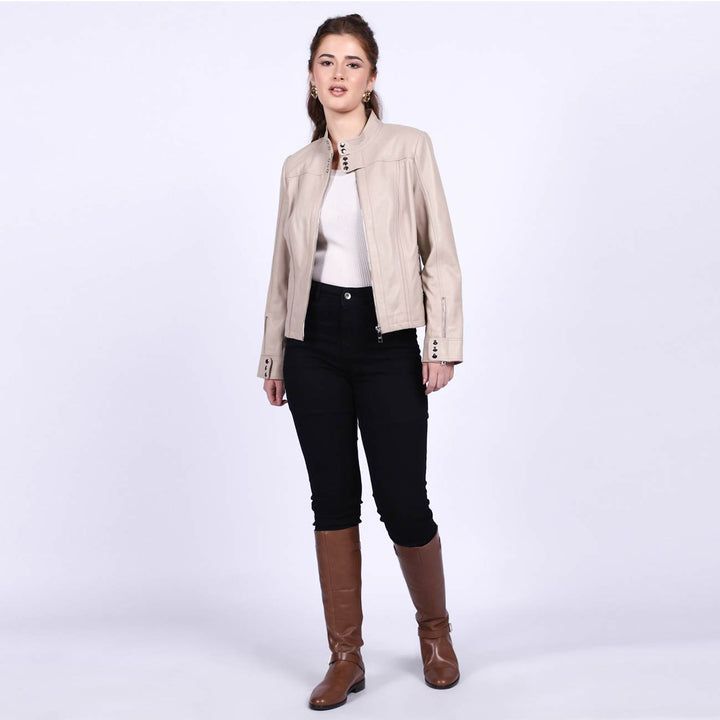 Women's beige leather cafe racer jacket UK by Saint Amaya, styled full-length lifestyle shot