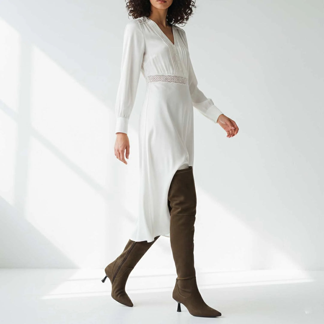 Women's olive suede thigh high boots UK by Saint Annelise, styled walking lifestyle shot