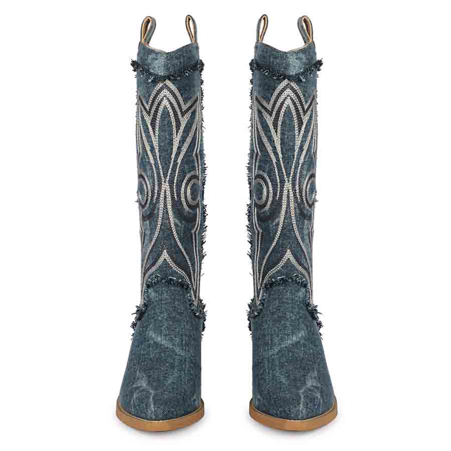 Women's denim knee high boots, front pair view of fleur embroidery