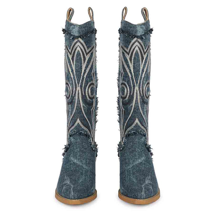 Women's denim knee high boots, front pair view of fleur embroidery