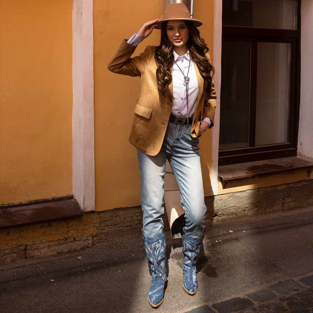 Women's denim knee high boots by Saint Aria, styled with a suede blazer, lifestyle view