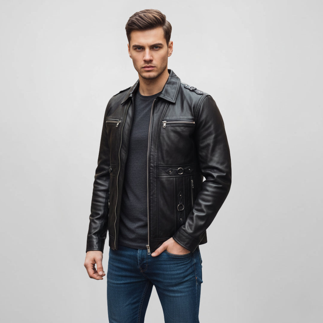 Man wearing an open black leather jacket with zip chest pockets.