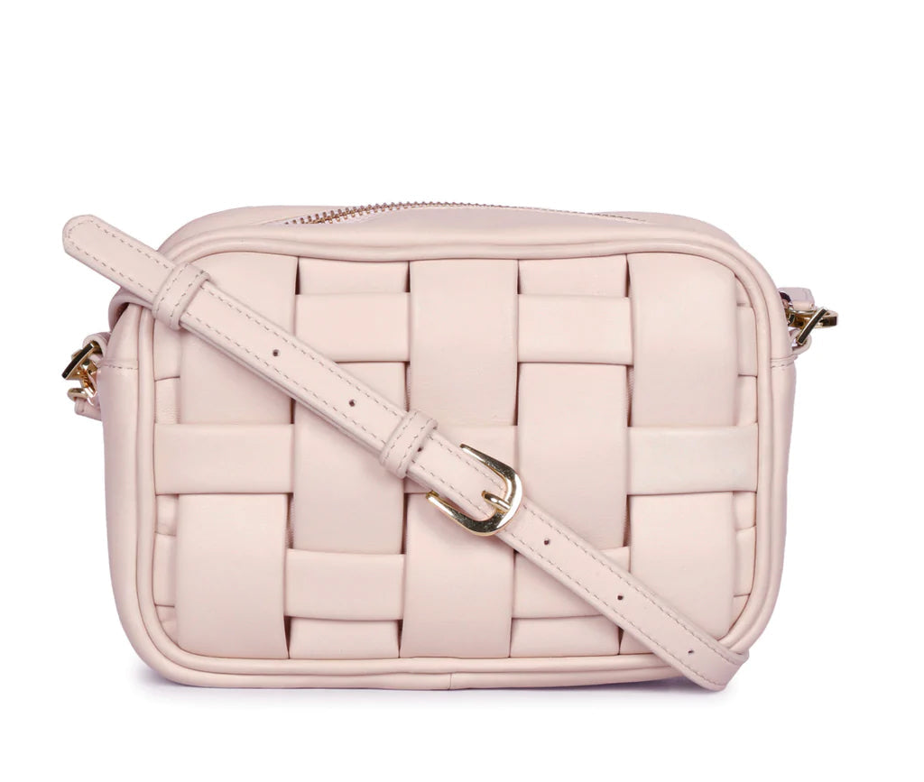 Saint Bennet pink blush woven leather cross body bag for women UK, front view with adjustable strap.