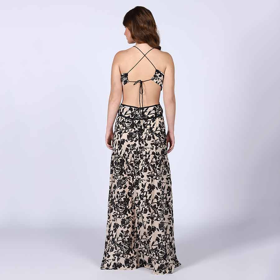 Women's black floral cutout waist maxi dress by Saint, three-quarter front view.