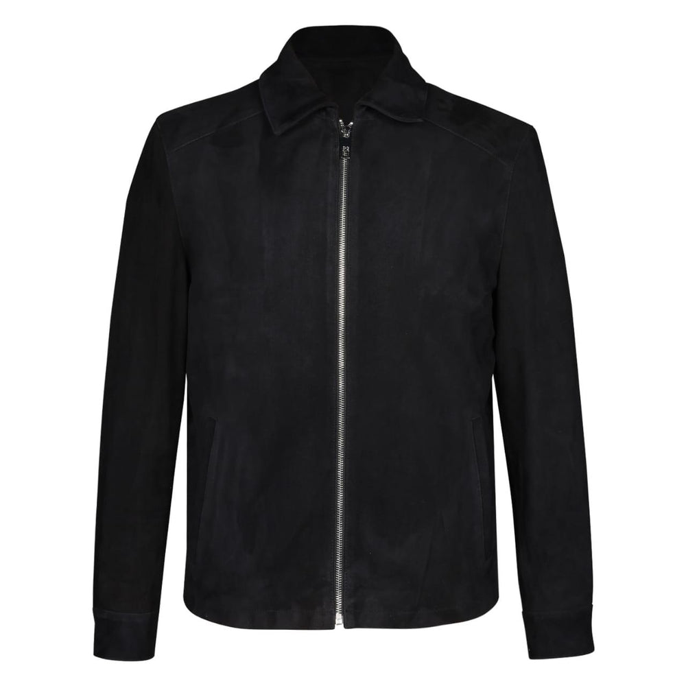 Man wearing a zipped-up black bomber jacket with fur trim.
