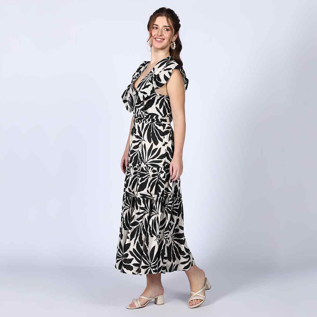 Women's black ivory palm-print lurex maxi dress by Saint, back view.