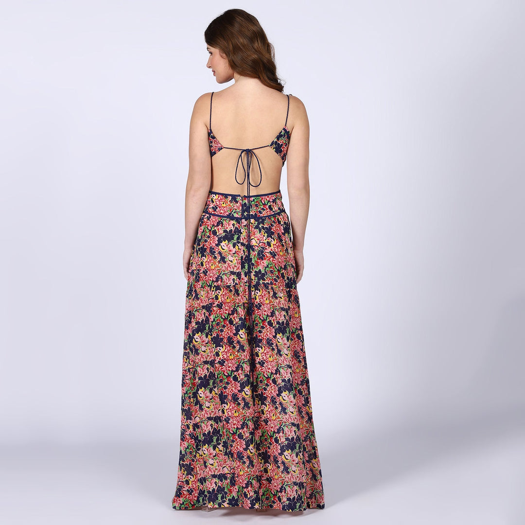 Women's blue multicolour floral cutout waist maxi dress by Saint, back view showing tie-back closure.
