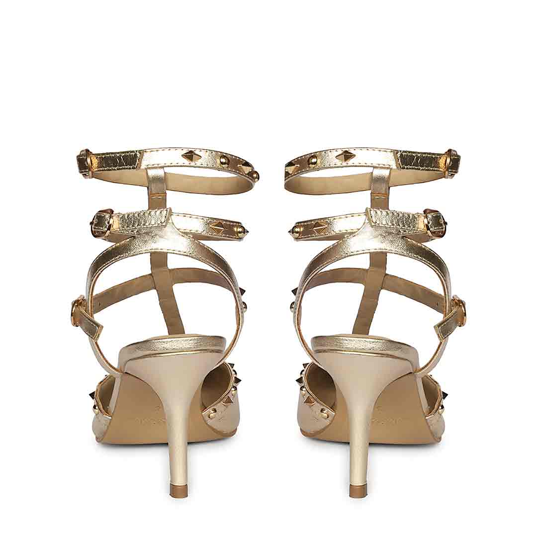 Saint Brittany studded cage gold leather stiletto pumps with caged upper design, back view