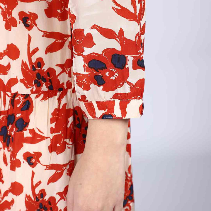 Close-up of floral print and cuff on Saint Brunella ivory red floral midi dress for women UK.